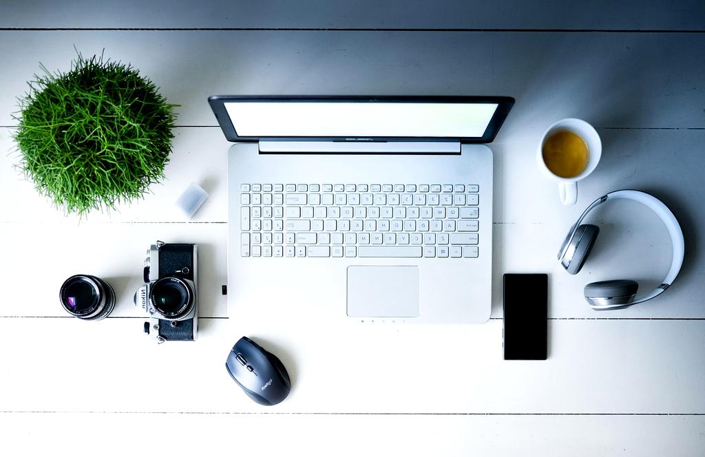 Modern AI-powered creative workspace with digital interfaces and innovative design elements